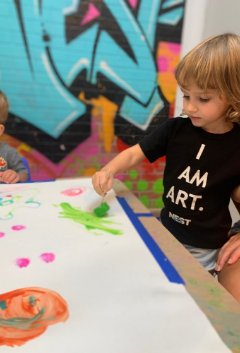 Family celebrating creativity at an Artnest workshop