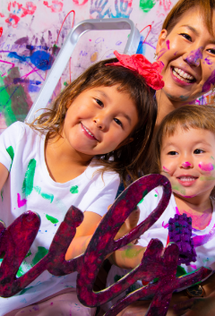 Parents and kids enjoying collaborative art at Artnest Studio