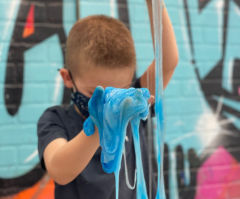 Kids celebrating with a colorful slime party at Artnest Studio
